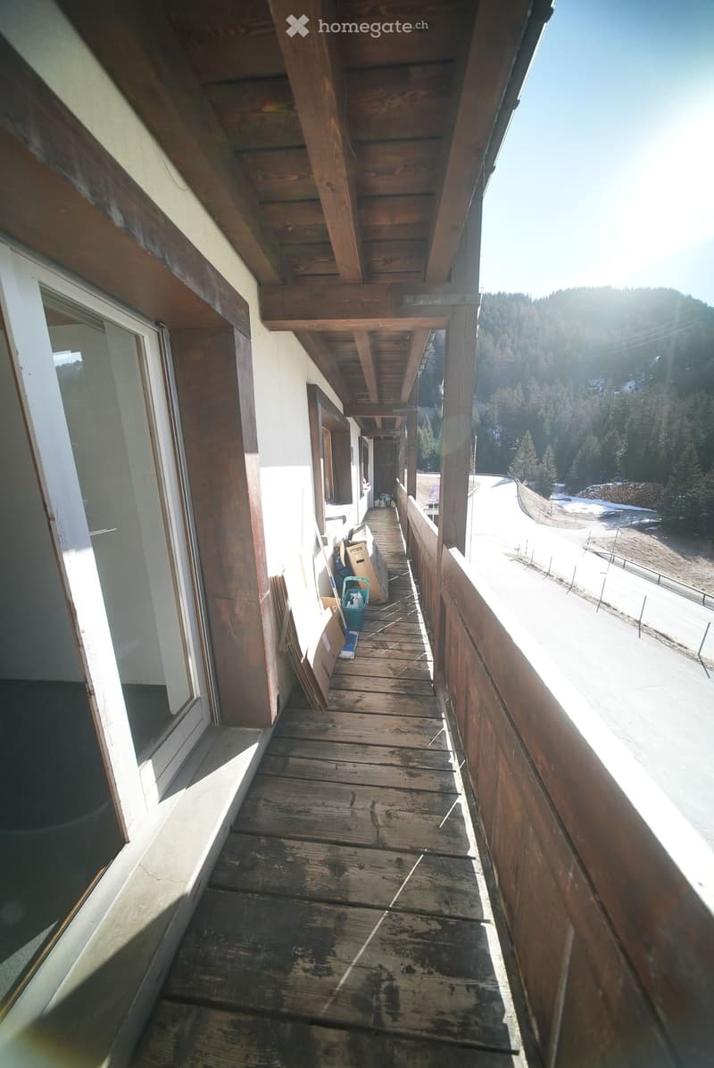 wooden balcony, wooden floor, glass door, wooden ceiling, view of the mountains