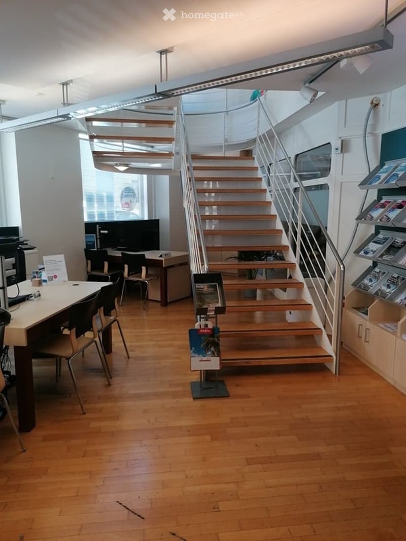 wooden floor, tables, chairs, desk, staircase