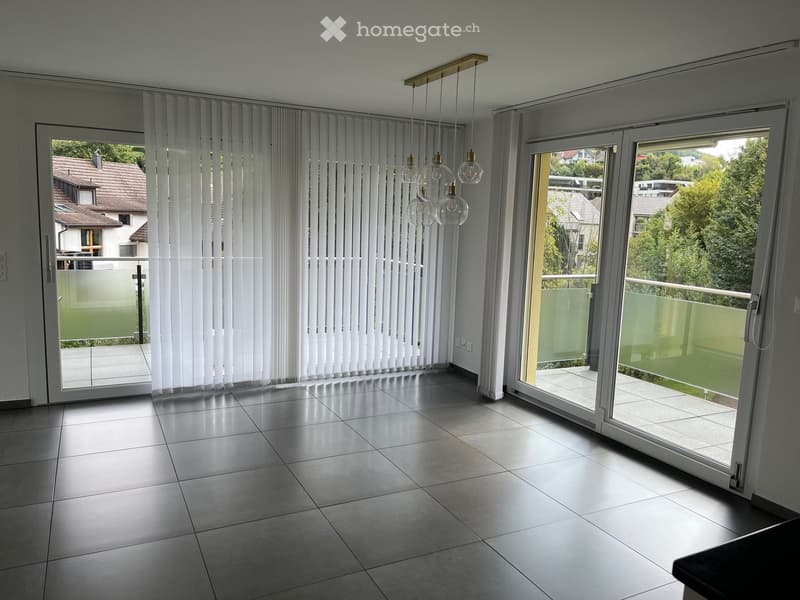empty room, sliding doors, balcony, tiled floor, chandelier