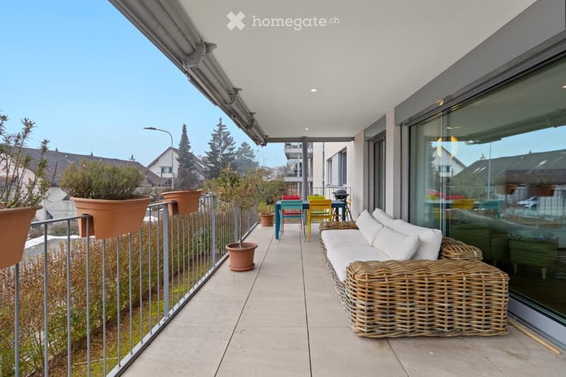 terrace with wicker sofa, potted plants, outdoor dining set