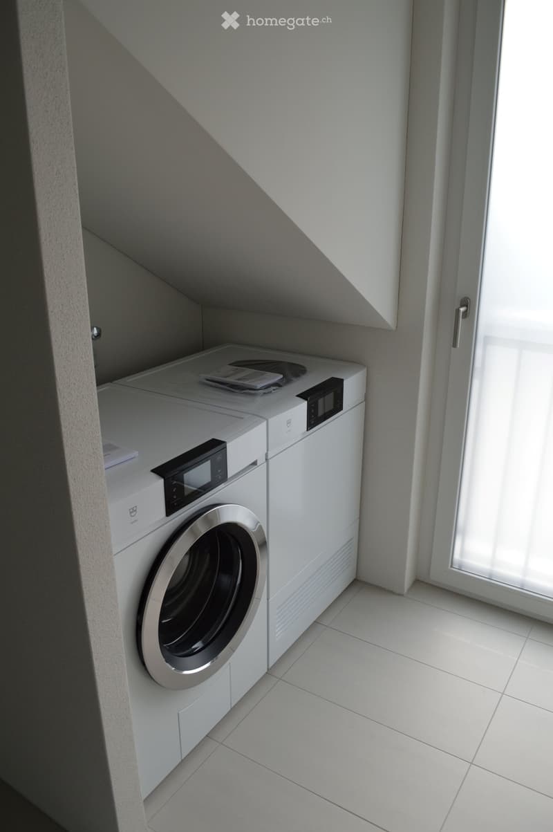 White tiled floor, white appliances, sliding door, under roof
