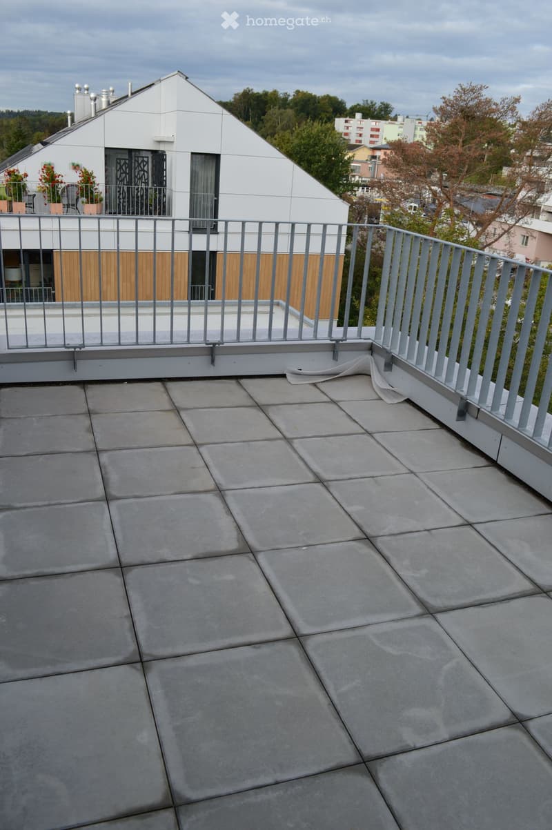 roof terrace with a steel fence, view of the surroundings