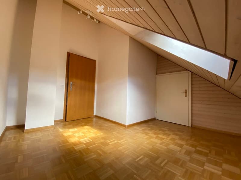 empty room, wooden floor, white walls, wooden ceiling, wooden door, skylight