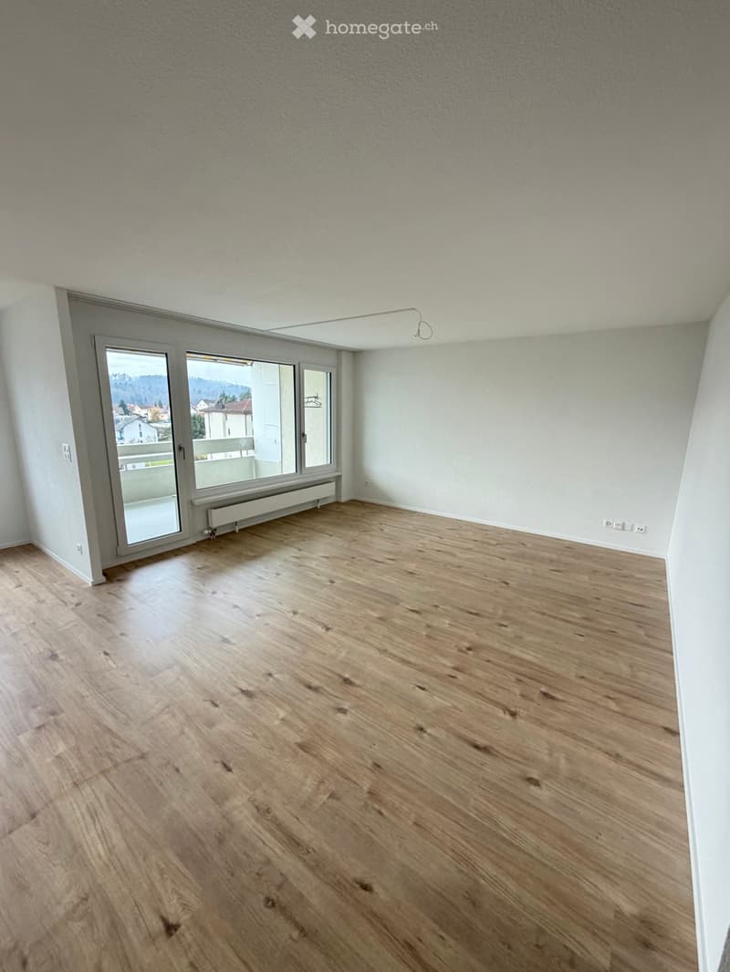 empty room, hardwood floors, large windows, balcony, power outlets, sliding glass door
