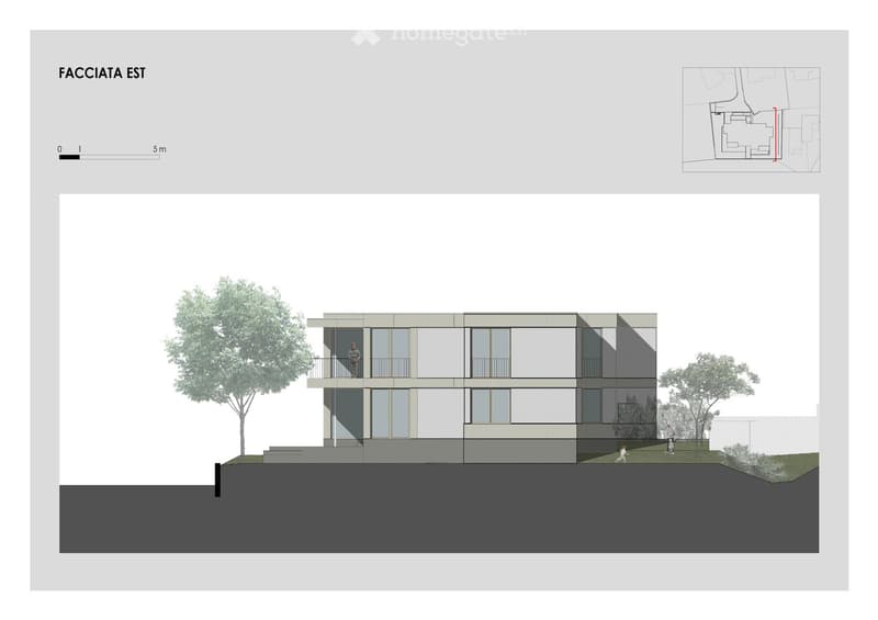 2 story building, gray exterior, large windows, balcony