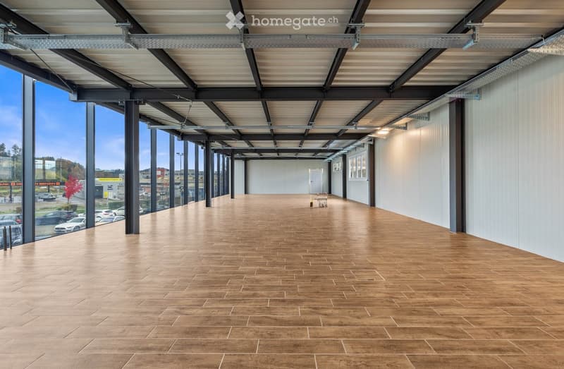 tiled floor, large glass windows, modern building, no furniture