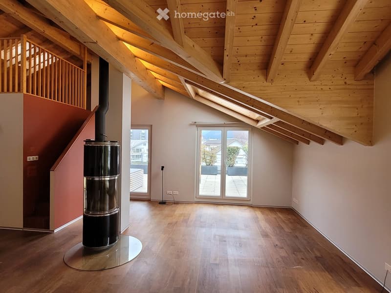 wooden ceiling, hardwood floor, fireplace, sliding glass door, staircase