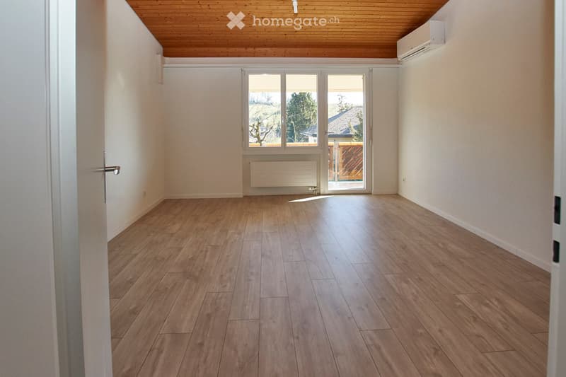 empty room, wooden floor, large windows, wooden balcony