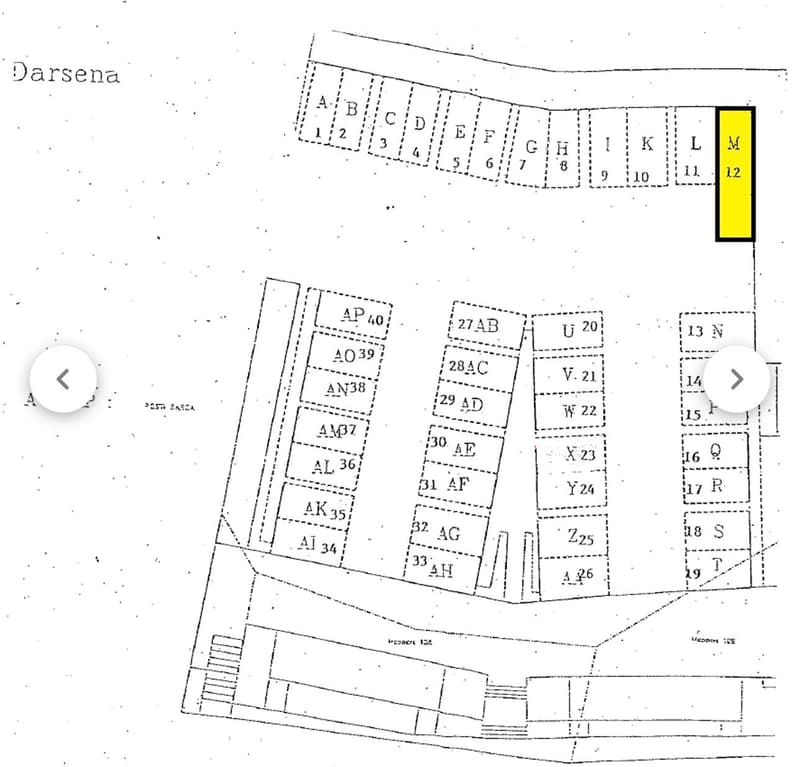16 lots labeled from A1 to L12 with areas provided, one lot highlighted in yellow.