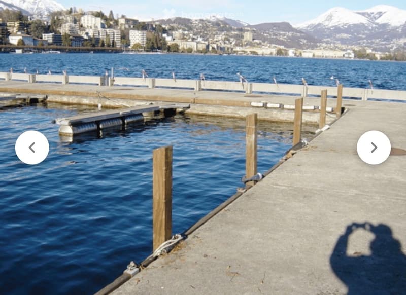 dockside view with mountains in the background