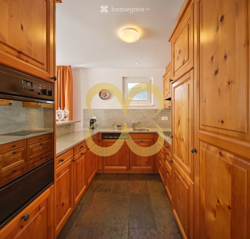 modern kitchen with wooden cabinets, granite countertops, integrated dishwasher, electric oven, stainless steel sink, bright ceiling light