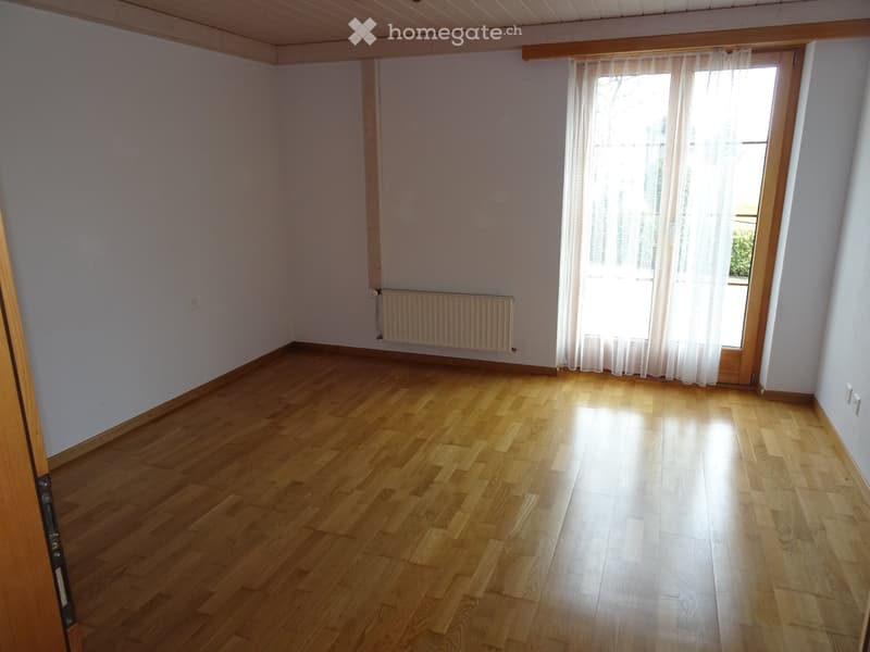 empty room, wooden floor, white walls, glass door, white curtains, wall-mounted radiator