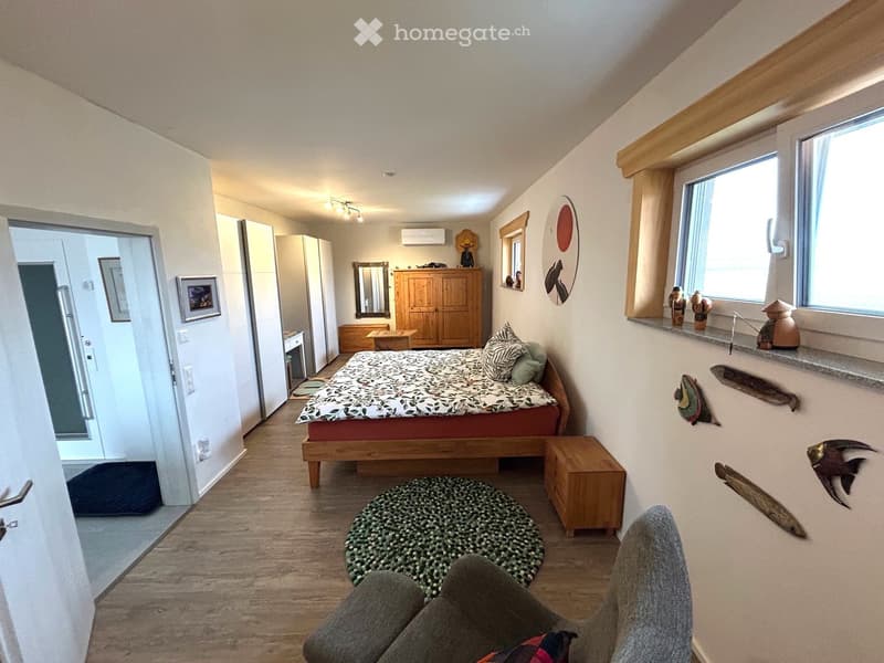 large bed, wooden cabinet, carpet, window sill decoration, wooden chair, wooden night stand