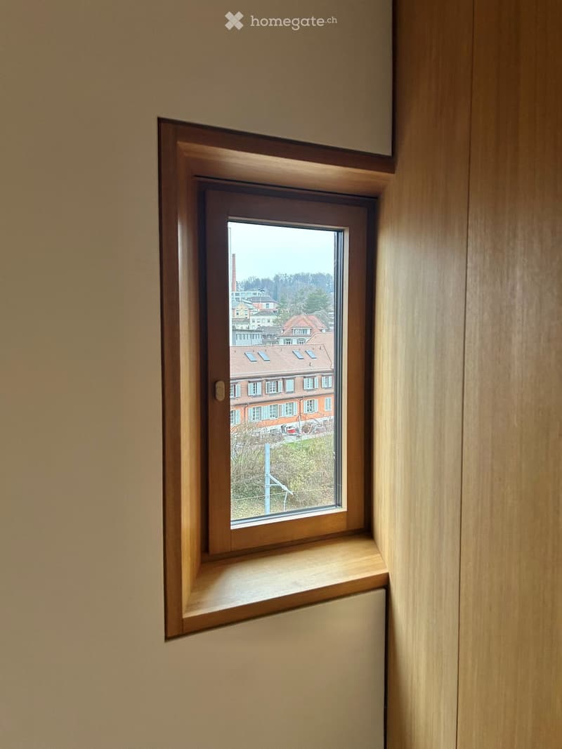 corner window with city view