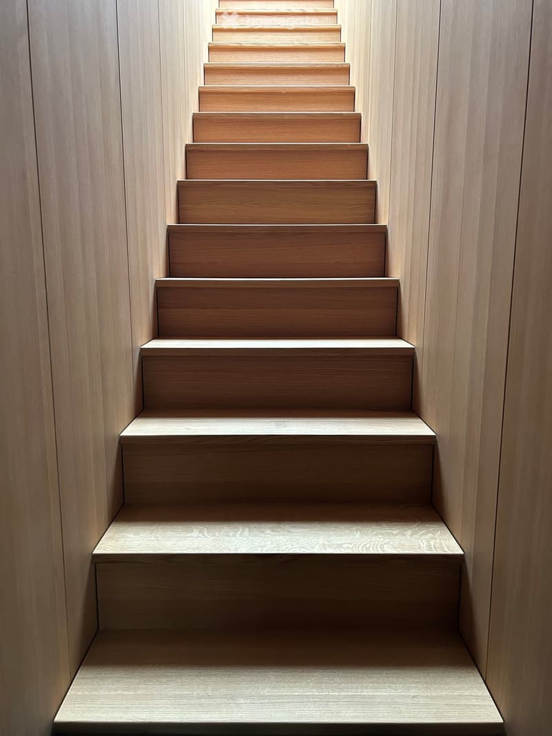 modern staircase with wooden steps, wooden risers, wooden handrails, wooden walls