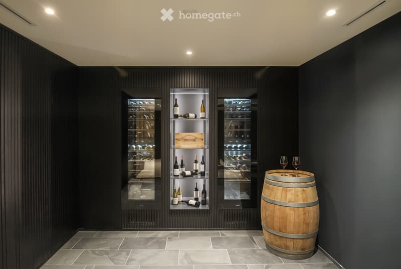 modern wine cellar with shelves, wine glasses, and a wooden barrel