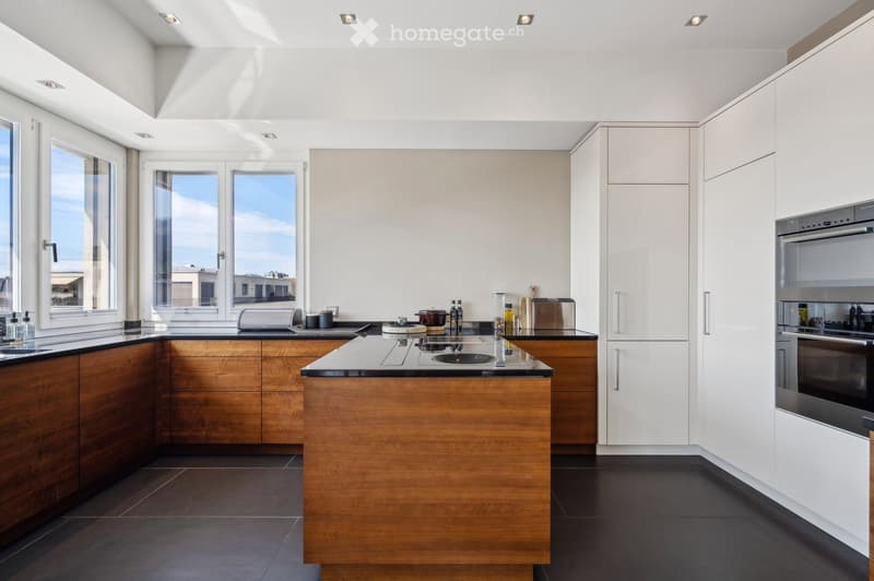 modern kitchen, wooden cabinets, black countertops, white appliances, large windows