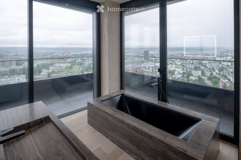 modern bathroom with floor to ceiling windows, bathtub with city view