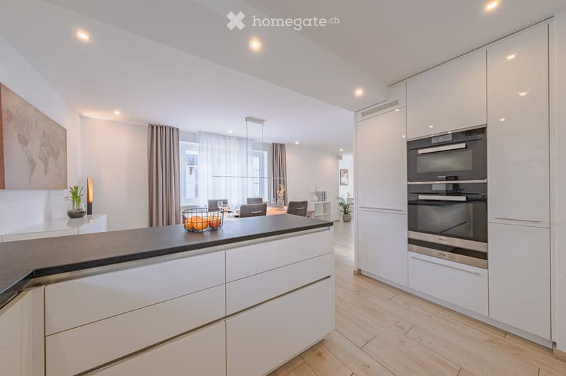 modern kitchen, white cabinets, wooden floor, granite countertop, double oven, dishwasher