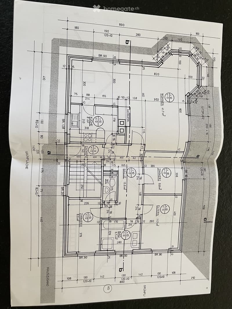 Floor plan of a house showing multiple rooms including living room, kitchen, bedrooms, and bathrooms with labeled dimensions and room labels.