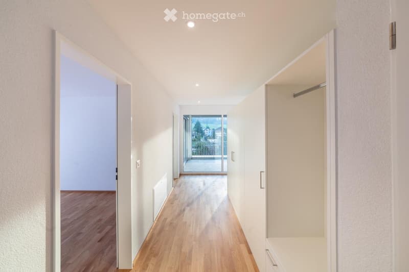 wooden floor, white walls, sliding glass door, balcony, closets