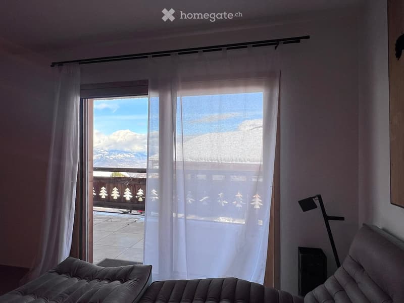 sofas, white curtains, balcony, lamp, view of mountains