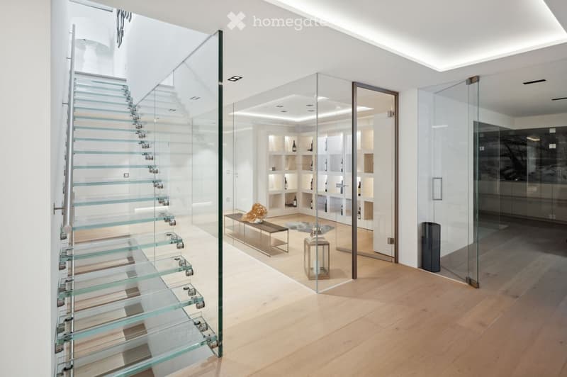 modern interior, glass walls, wooden floor, glass staircase, wine rack, bench, lantern