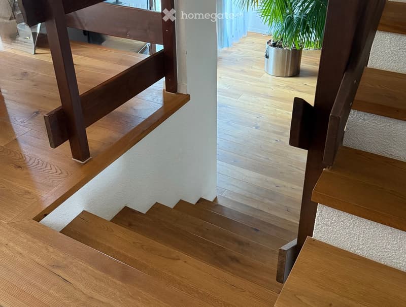 Raised ground floor, wooden staircase, wooden floors