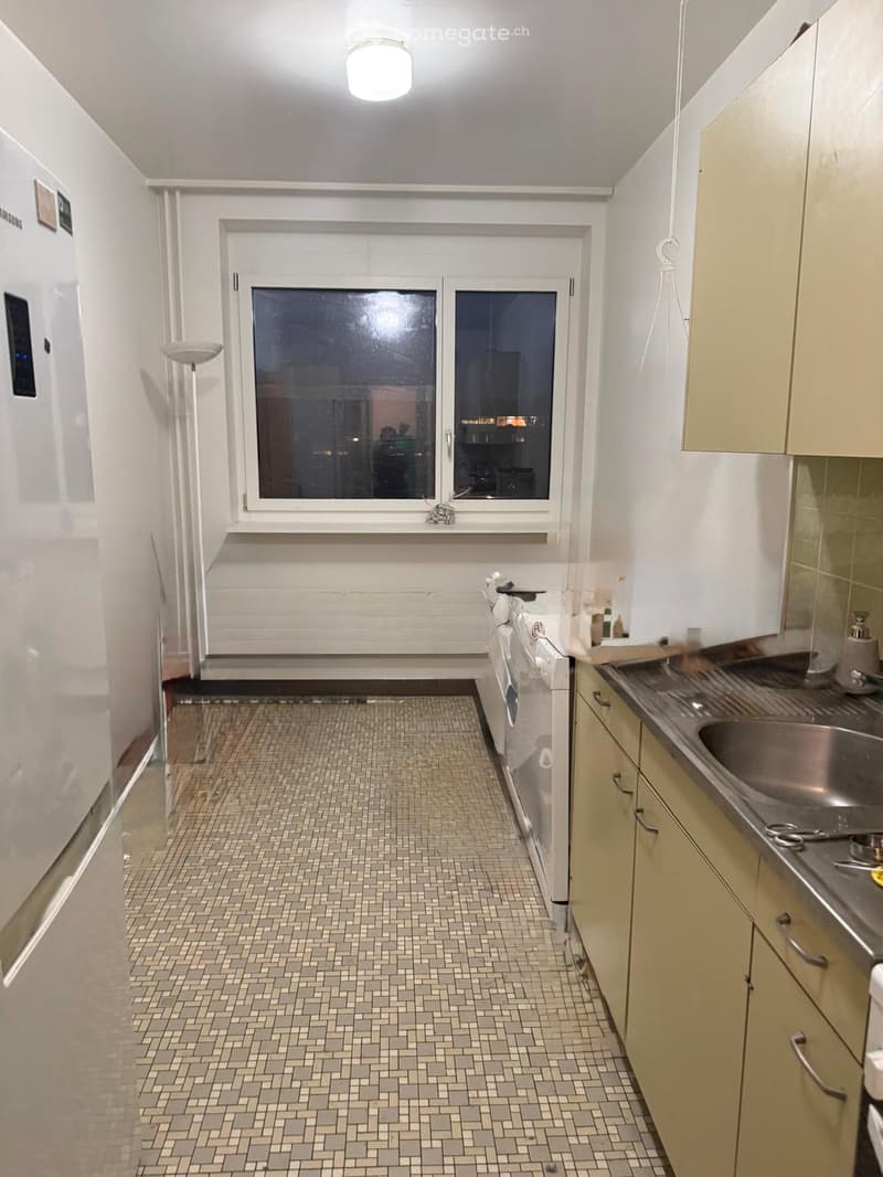 kitchen with tiled floor, white walls, window, washing machine, sink, cabinets, refrigerator