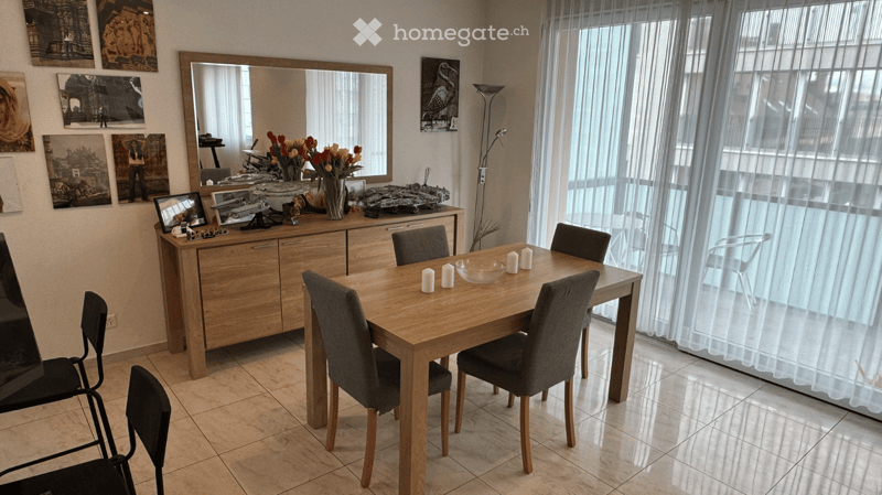 dining table, chairs, wooden cabinet, mirror, flower vase, picture frames, floor lamp, balcony, windows