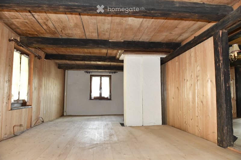 wooden walls, wooden floor, wooden beams, windows, white pillar