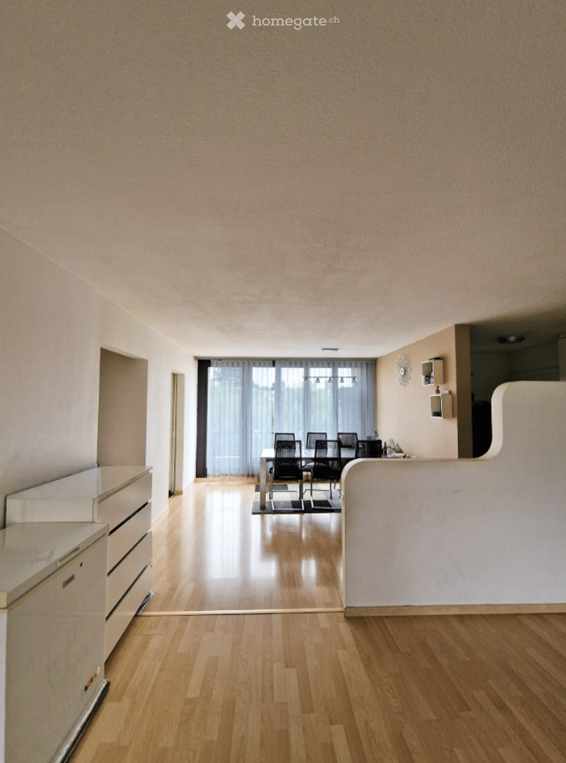 empty room, large window with curtains, wooden floor, white walls