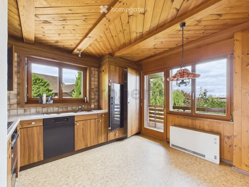 kitchen with wooden cabinets, white appliances, large windows, wooden ceiling, tiled floor