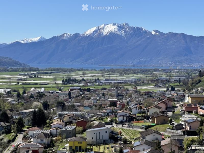 Mountains, houses, lake, wide angle