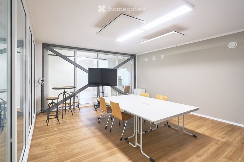 modern meeting room, white table, yellow chairs, glass walls, large windows, ceiling lights, black TV