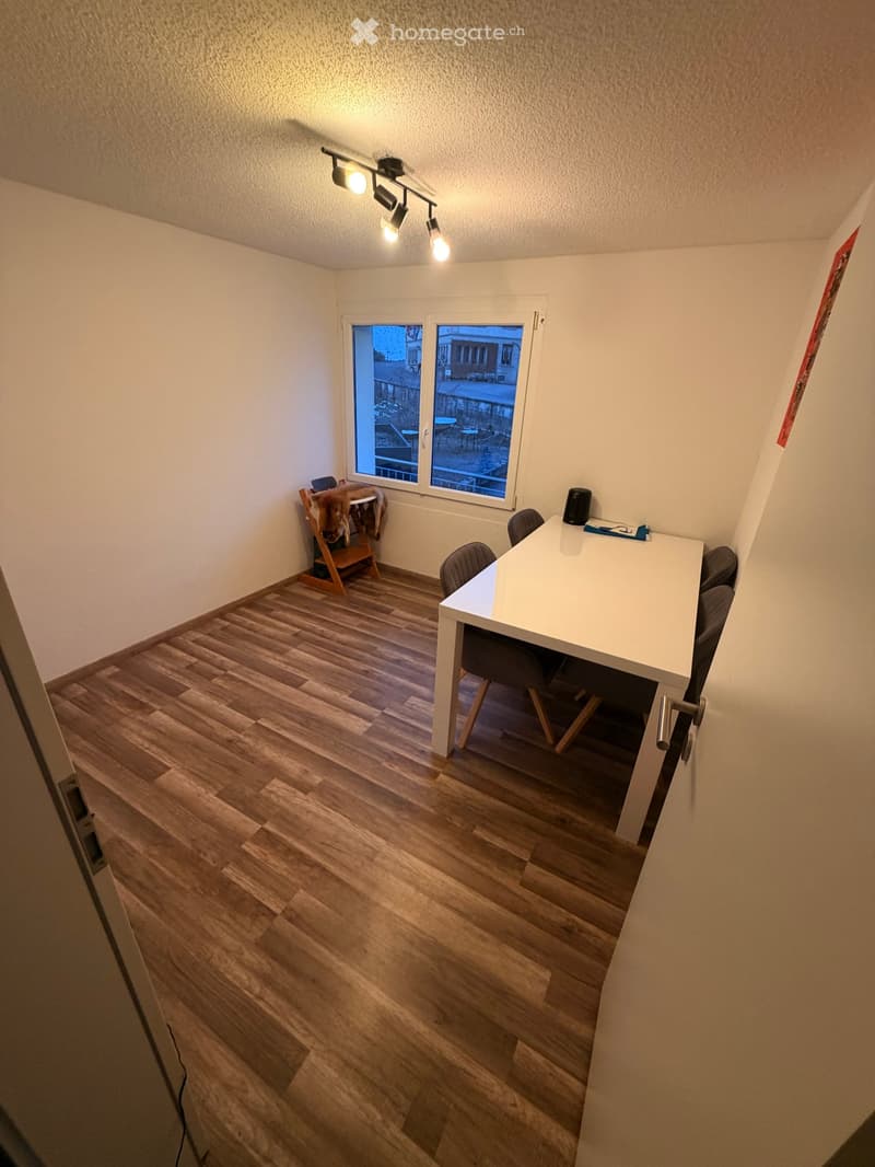 empty room, wooden floor, white walls, white ceiling, white table, chairs, window, lights