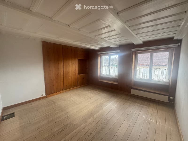 empty room, wooden floor, wooden wall, two windows, wooden ceiling