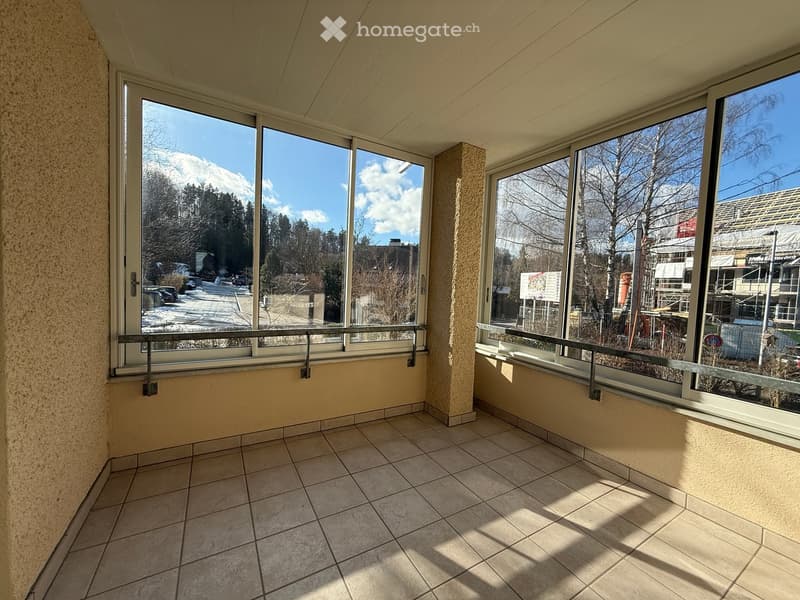 large windows, balcony, tiled flooring, no furniture