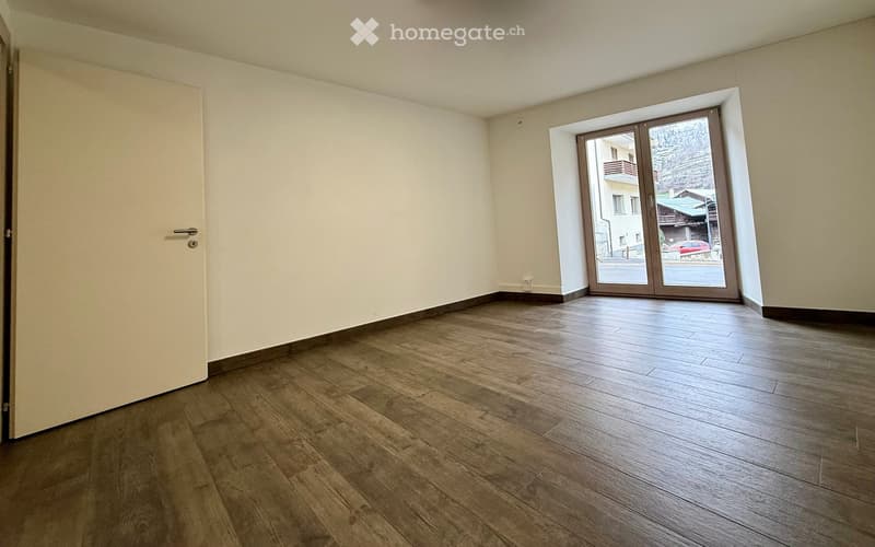 empty room, wooden floor, white walls, sliding glass door, balcony