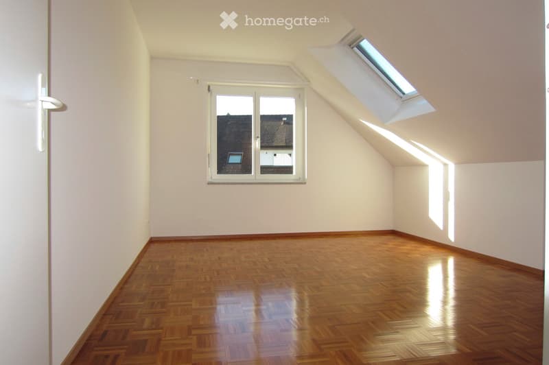 empty room, wooden floor, white walls, window, skylight
