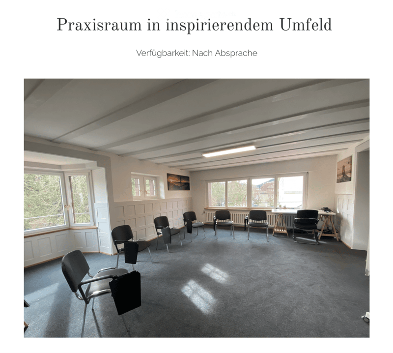 Empty room with chairs, windows, radiators, ceiling lamp, picture on the wall