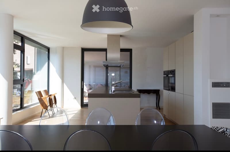 modern kitchen with island, large windows, wooden floor, modern furniture, large lamp