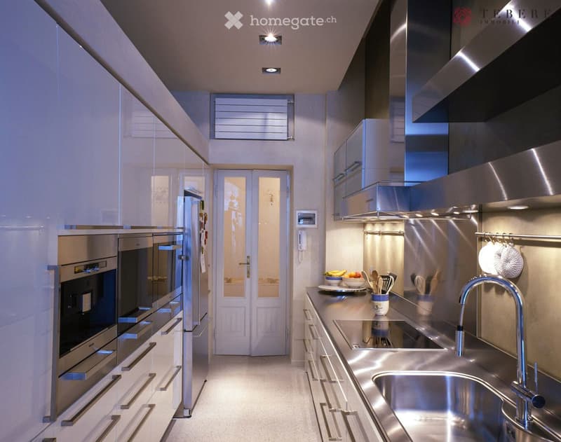 modern kitchen, stainless steel appliances, white cabinets, double oven, refrigerator, dishwasher, granite countertops, under-cabinet lighting