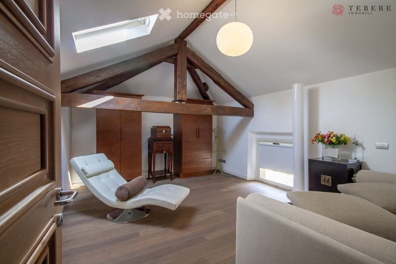 wooden beams, wooden floor, white leather chair, white sofa, wooden cabinet, flower vase, wooden table