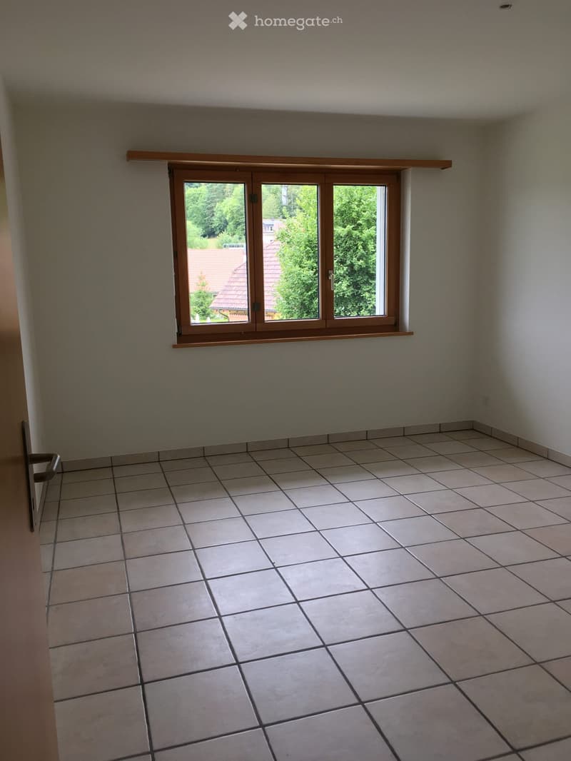 empty room, white walls, tiled floor, window with view