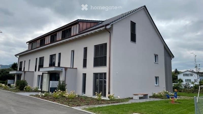 2 story house, white exterior, modern design, large windows, driveway, garden, bench