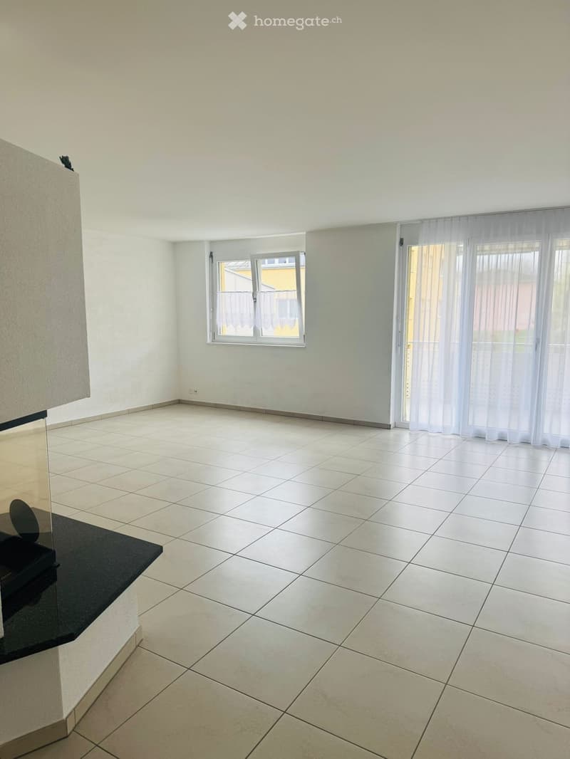 empty room, white tiles, white walls, sliding glass doors, balcony, fireplace