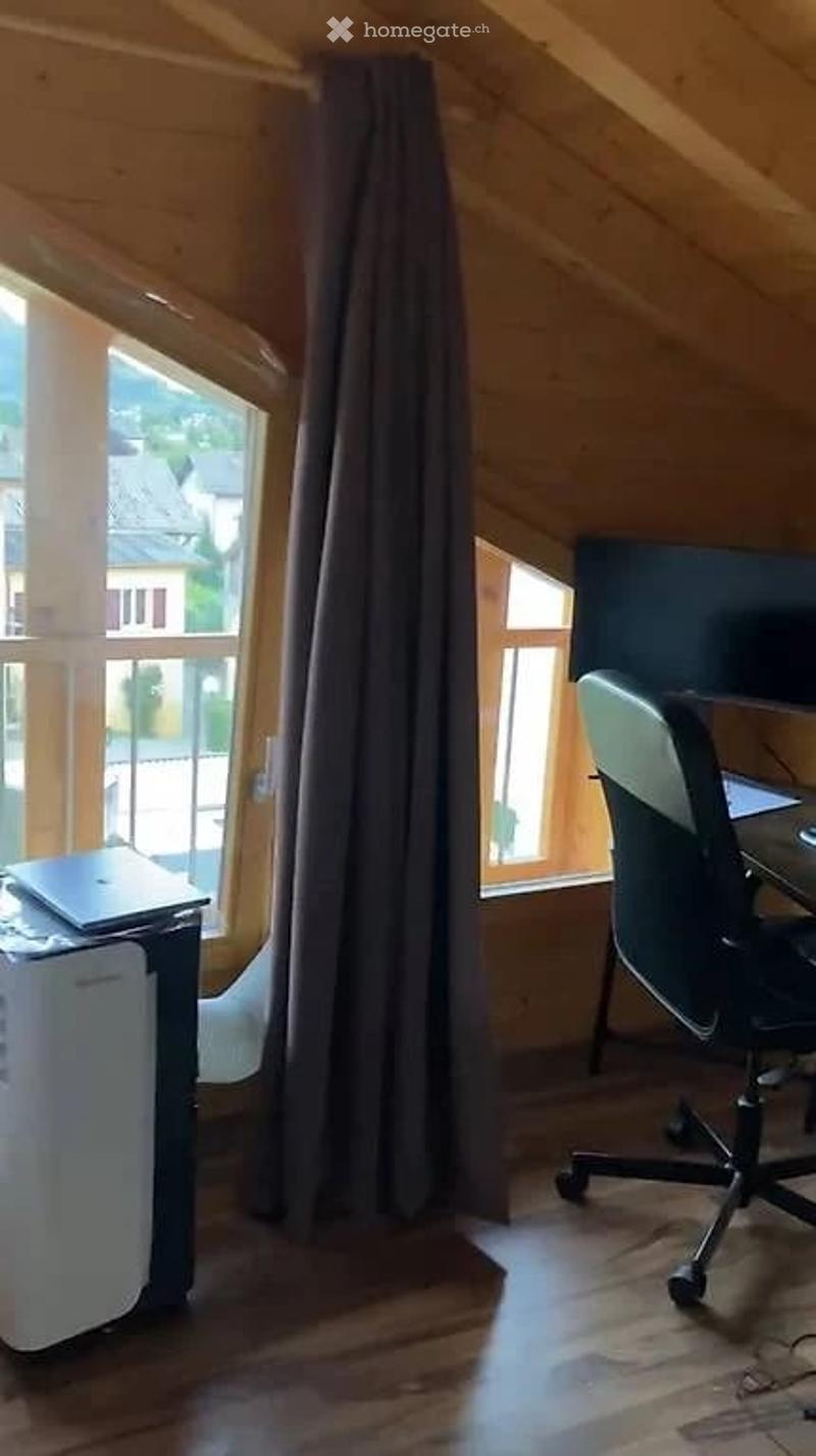 wooden floor, wooden ceiling, large window, desk, chair, laptop, air purifier
