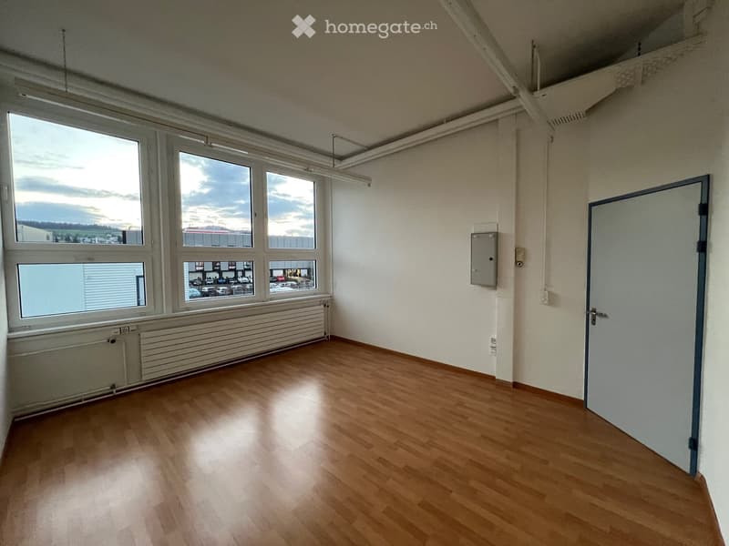 empty room, wooden floor, white walls, large windows, radiators, door