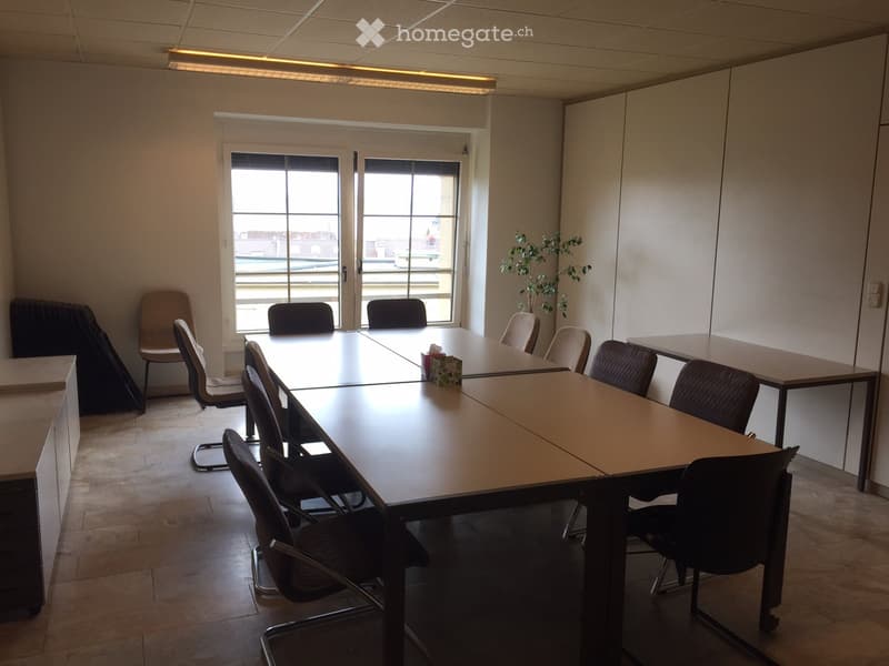empty room, long tables, chairs, windows, white walls, tiled floor